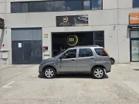 Usado Suzuki Ignis 69 CV (50 kW) 2007 Gris / plata Utilitario