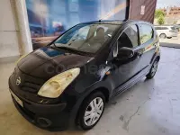 Usado Nissan Pixo Visia 68 CV (50 kW) 2012 Negro Utilitario