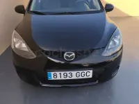 Usado Mazda 2 Active 68 CV (50 kW) 2008 Negro Utilitario