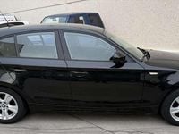 Usado BMW 116 122 CV (89 kW) 2010 Negro Utilitario
