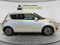 Usado Suzuki Swift 95 CV (69 kW) 2013 Gris / plata Utilitario