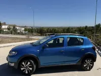 Usado Dacia Sandero Stepway 90 CV (66 kW) 2013 Azul Utilitario