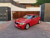 Usado BMW 118 Comfort Edition 143 CV (105 kW) 2013 Rojo Utilitario