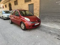 Usado Nissan Micra Visia+ 80 CV (58 kW) 2006 Granate Berlina