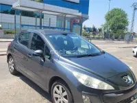 Usado Peugeot 308 90 CV (66 kW) 2009 Gris / plata Berlina