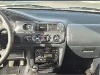 Usado Ford Escort 75 CV (55 kW) 1998 Verde Berlina