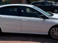 Usado Renault Laguna III Dynamique 110 CV (80 kW) 2012 Blanco Berlina