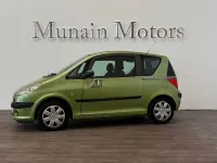 Usado Peugeot 1007 110 CV (80 kW) 2006 Verde Monovolumen