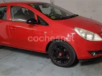 Używany Opel Corsa Cosmo 90 KM (66 kW) 2009 Czerwony Hatchback