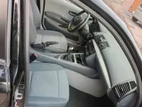 Usado BMW 118 122 CV (89 kW) 2005 Negro Utilitario