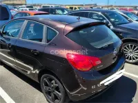 Usado Opel Astra Expression 115 CV (84 kW) 2013 Marrón Berlina