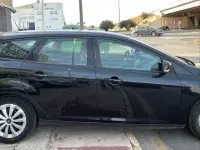 Usado Ford Focus Trend 95 CV (69 kW) 2013 Negro Familiar