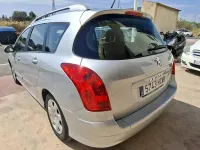 Usado Peugeot 308 SW Envy 120 CV (88 kW) 2011 Gris / plata Familiar