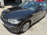 Usado BMW 116 122 CV (89 kW) 2009 Negro Utilitario