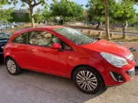 Usado Opel Corsa Selective 86 CV (63 kW) 2013 Rojo Utilitario