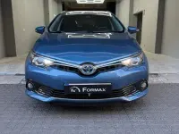 Używany Toyota Auris Hybrid Business Edition 136 KM (100 kW) 2016 Niebieski Sedan/Limuzyna