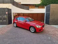 Usado BMW 118 Comfort Edition 143 CV (105 kW) 2013 Rojo Utilitario