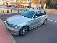Usado BMW 116 122 CV (89 kW) 2005 Gris Utilitario