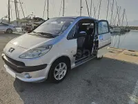 Usado Peugeot 1007 75 CV (55 kW) 2005 Gris / plata Monovolumen