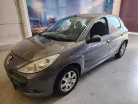 Usado Peugeot 206 60 CV (44 kW) 2010 Gris / plata Berlina