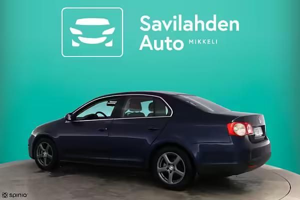 Käytetty VW Touran 143 HP (105 kW) 2006 Harmaa Tila-auto