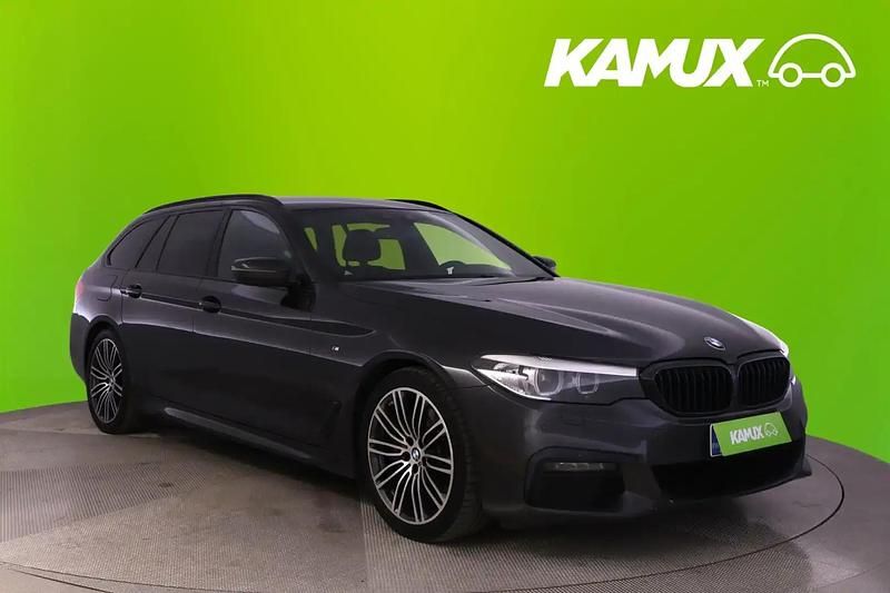 Hopea / harmaa Käytetty 2019 BMW 530 Shadowline Farmari | 29 890 € (Supertarjous) - Kuva 1/4