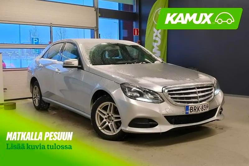 Käytetty Mercedes E200 Business 136 HP (100 kW) 2014 Hopea / harmaa Sedan