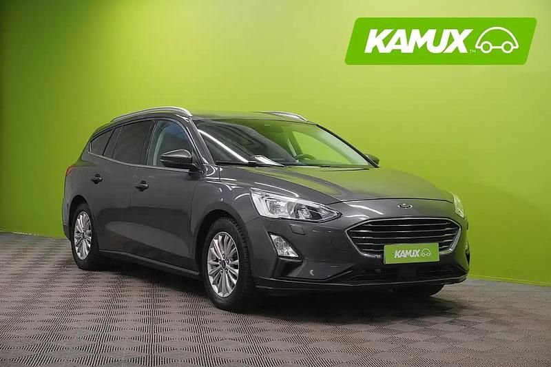 Hopea / harmaa Käytetty 2019 Ford Focus Titanium Farmari | 12 790 € (Perustarjous) - Kuva 1/4