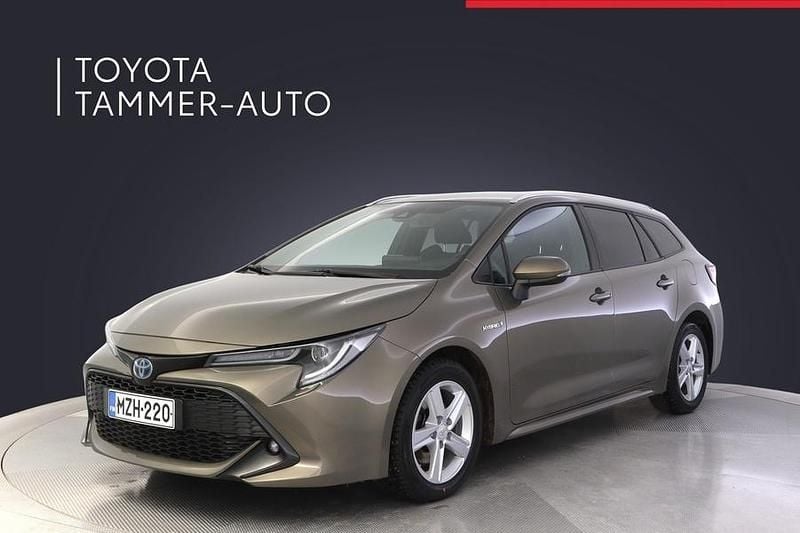 Ruskea (beige) Käytetty 2021 Toyota Corolla Active Farmari | 22 980 € (Perustarjous) - Kuva 1/3