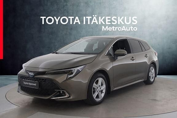 Ruskea (beige) Käytetty 2023 Toyota Corolla Edition Farmari | 28 690 € (Perustarjous) - Kuva 1/4