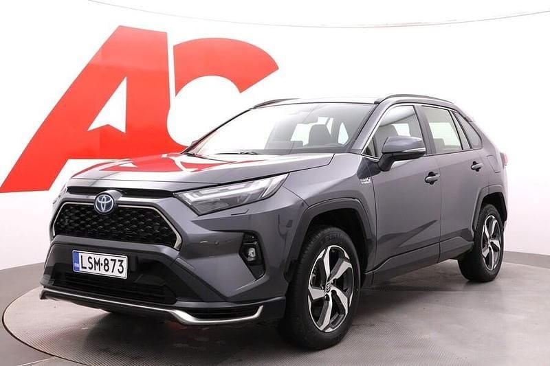 1g3 tummanharmaa Käytetty 2023 Toyota RAV4 Hybrid Active Katumaasturi | 46 990 € (Hieman kallis) - Kuva 1/4