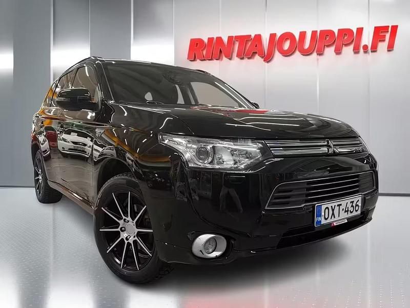 Käytetty Mitsubishi Outlander P-HEV Intense 135 HP (99 kW) 2013 Harmaa Katumaasturi