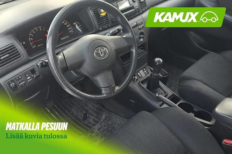 Käytetty Toyota Corolla 110 HP (80 kW) 2004 Hopea / harmaa Sedan