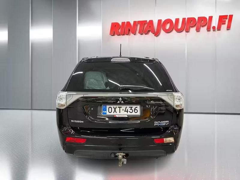 Käytetty Mitsubishi Outlander P-HEV Intense 135 HP (99 kW) 2013 Harmaa Katumaasturi