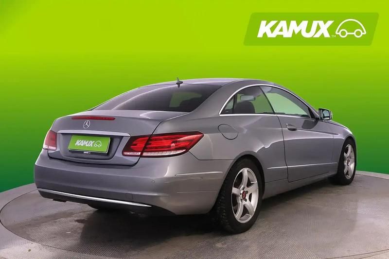 Käytetty Mercedes E220 170 HP (125 kW) 2014 Hopea / harmaa Coupe - kaksiovinen