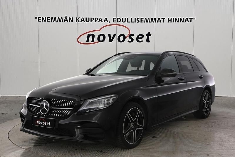 Musta Käytetty 2021 Mercedes C300e AMG Farmari | 19 970 € (Perustarjous) - Kuva 1/4