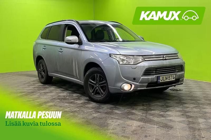 Musta Käytetty 2014 Mitsubishi Outlander P-HEV Instyle Katumaasturi | 7 380 € - Kuva 1/4