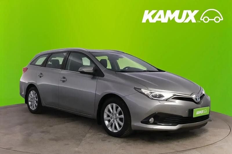 Hopea / harmaa Käytetty 2015 Toyota Auris Touring Sports Multidrive S Farmari | 7 850 € (Perustarjous) - Kuva 1/4