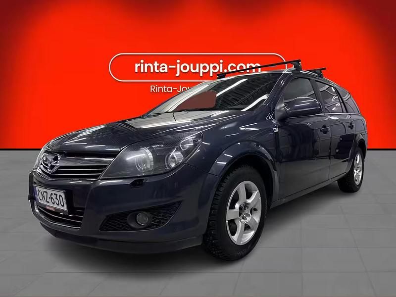 Violetti Käytetty 2010 Opel Astra Ultimate Farmari | 3 490 € - Kuva 1/4