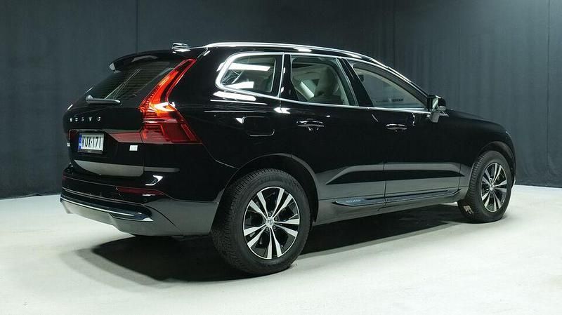 Käytetty Volvo XC60 Plus 350 HP (257 kW) 2023 Musta Katumaasturi