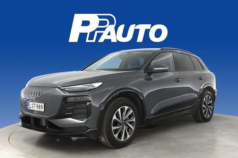 Harmaa Käytetty 2024 Audi Q6 e-tron Advanced Katumaasturi | 63 290 € (Supertarjous) - Kuva 1/4