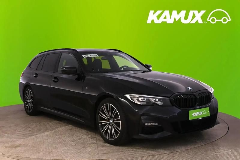 Musta Käytetty 2021 BMW 318 M Sport Farmari | 24 890 € (Kallis) - Kuva 1/4