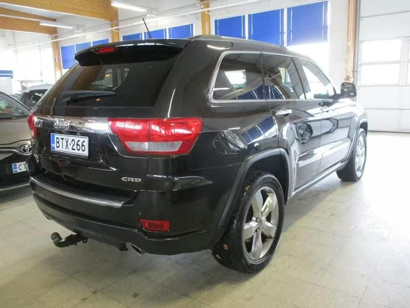 Käytetty Jeep Grand Cherokee Overland 241 HP (177 kW) 2012 Musta Katumaasturi