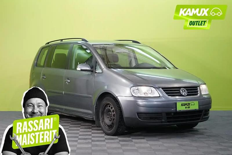 Käytetty VW Touran Trendline 116 HP (85 kW) 2004 Hopea / harmaa Tila-auto