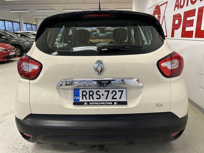 Käytetty Renault Captur Dynamique 120 HP (88 kW) 2014 Valkoinen Katumaasturi
