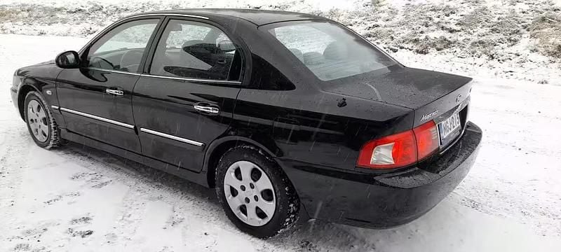 Käytetty Kia Magentis LX 230 HP (169 kW) 2005 Musta Sedan