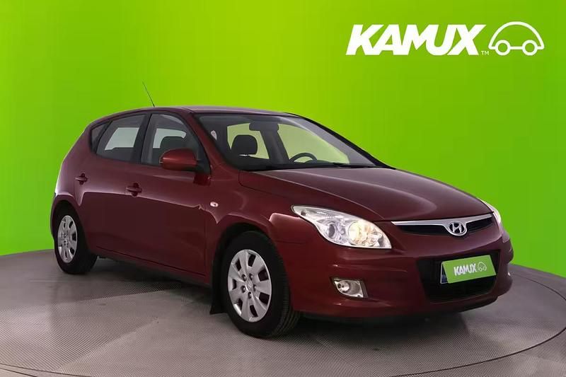 Punainen Käytetty 2009 Hyundai i30 Comfort Tila-auto | 5 900 € (Perustarjous) - Kuva 1/4