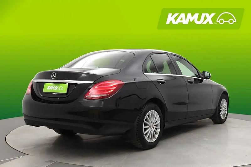 Käytetty Mercedes A180 Premium 156 HP (114 kW) 2014 Musta Sedan