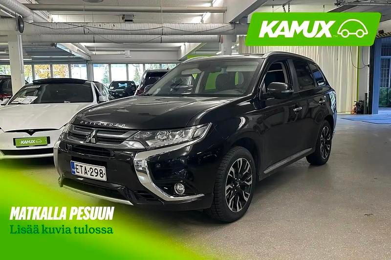 Musta Käytetty 2015 Mitsubishi Outlander P-HEV Instyle Farmari | 14 900 € (Perustarjous) - Kuva 1/4