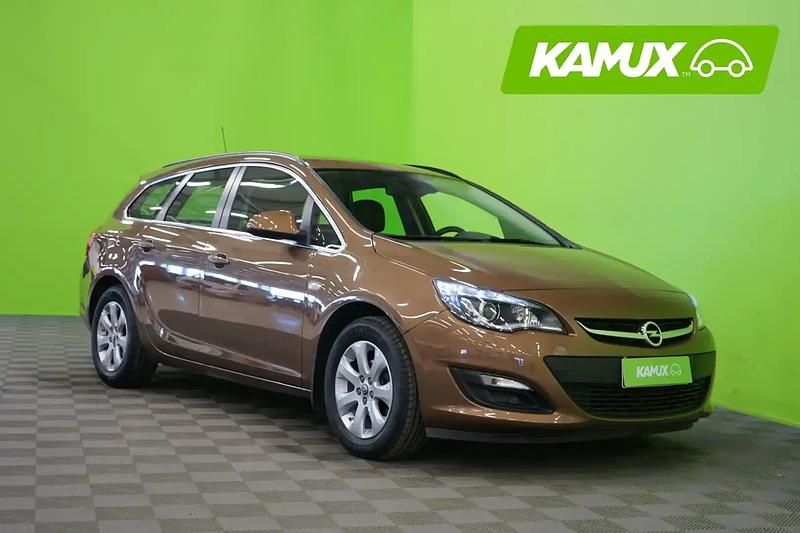 Ruskea Käytetty 2015 Opel Astra drive Farmari | 11 490 € (Perustarjous) - Kuva 1/4